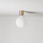 Wandleuchte aus Metall mit Globuslampe in Porzellanoptik