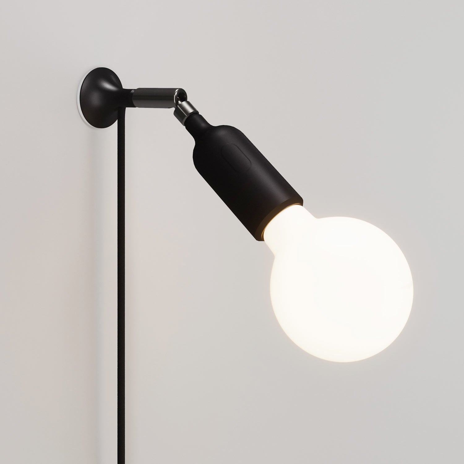 Lampada da parete MAG-Y con snodo, portalampada in silicone con interruttore e spina UK - Nero