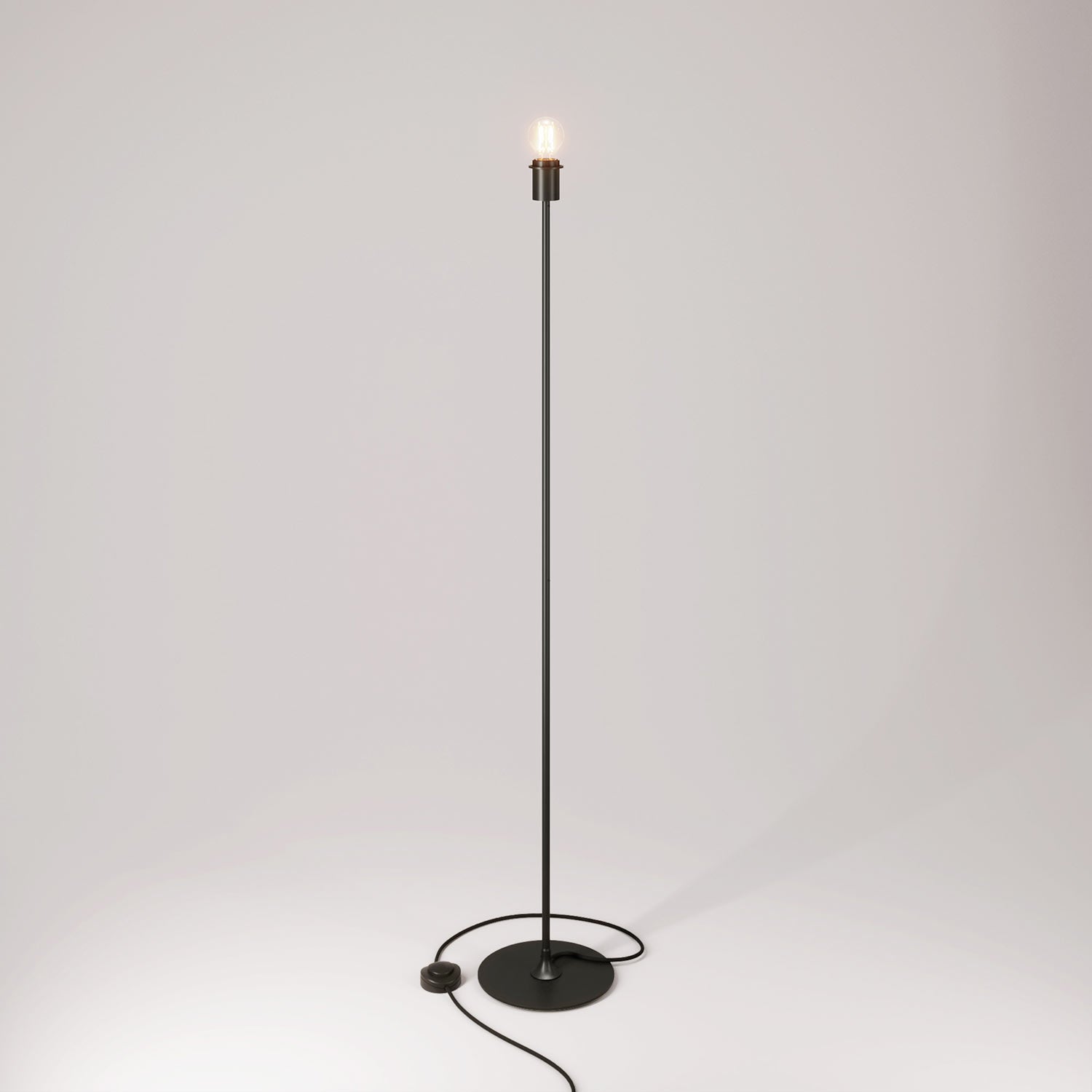 Lampada da terra MAG-Y con base metallica tonda con predisposizione per paralume e spina UK - Nero